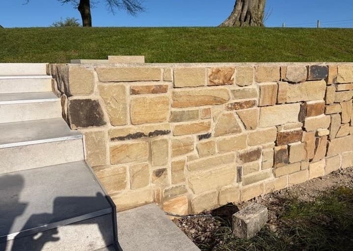 Natural stone retaining wall